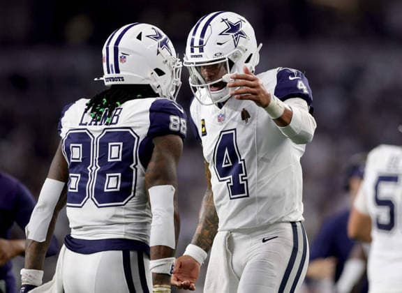 September 20, 2026, Arlington, Texas, US: Dallas Cowboys quarterback Dak Prescott (4) celebrates a touchdown with wide receiver CeeDee Lamb against the Washington Commanders on Sunday, Sept. 20, 2026, at AT&T Stadium in Arlington, Texas. PrescottÃ¢â‚¬â ¢s touchdown throw meant be surpassed Tony Romo for the franchise s career passing touchdowns leader. Arlington US - ZUMAm67_ 0867368200st Copyright: xAmandaxMccoyx