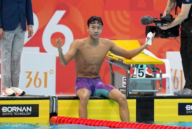 (260922) -- TOKYO, Sept. 22, 2026 -- Zhan Zhanshuo of China celebrates after the men s 1500m freestyle final at the 20th Asian Games Aichi-Nagoya 2026 in Tokyo, Japan, Sept. 22, 2026. (Photo by Xinhua) (SP)JAPAN-TOKYO-ASIAN GAMES-SWIMMING-MEN S 1500M FREESTYLE WangxShen 