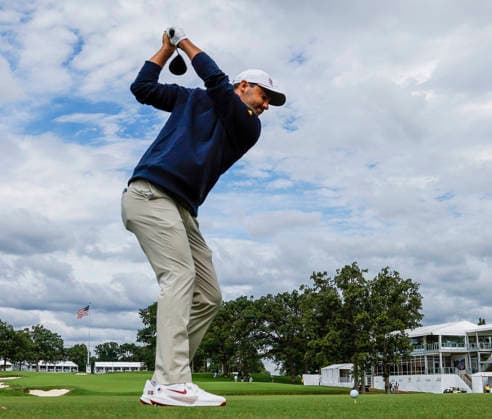 Scottie Scheffler of the US hits a tee shot on the fourteenth hole during practice for the Presidents Cup golf tournament at Medinah Country Club in Medinah, Illinois on Tuesday, September 22, 2026. Competition between the USA and the International team begins on Thursday, September 24 with Four-Ball play.  MED20260922904 TANNENxMAURY