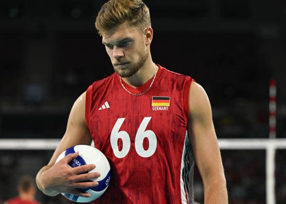 Poland And Germany Battle For Semifinal Spot At EuroVolley 2026 SOFIA, BULGARIA - SEPTEMBER 22: Erik Roehrs ( 66) of Germany cradles the match ball near his chest while looking down focused against Poland during their CEV Enel EuroVolley 2026 Men quarterfinal match at Arena 8888 Sofia in Sofia, Bulgaria, on September 22, 2026. Sofia Bulgaria  Copyright: xArturxWidakx originalFilename:widak-polandan260922_npppp.jpg