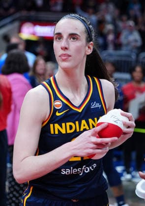 INDIANAPOLIS, IN - SEPTEMBER 22: Indiana Fever guard Caitlin Clark (22) throws autograph mini basketballs to the fans in the stands after defeating the Minnesota Lynx on Fan Appreciation Night on September 22, 2026, at Gainbridge Fieldhouse in Indianapolis, Indiana. (Photo by Brian Spurlock Icon Sportswire) WNBA, Basketball Damen, USA SEP 22 Minnesota Lynx at Indiana Fever EDITORIAL USE ONLY Icon26092224