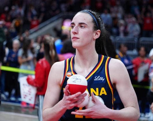 INDIANAPOLIS, IN - SEPTEMBER 22: Indiana Fever guard Caitlin Clark (22) throws autograph mini basketballs to the fans in the stands after defeating the Minnesota Lynx on Fan Appreciation Night on September 22, 2026, at Gainbridge Fieldhouse in Indianapolis, Indiana. (Photo by Brian Spurlock Icon Sportswire) WNBA, Basketball Damen, USA SEP 22 Minnesota Lynx at Indiana Fever EDITORIAL USE ONLY Icon26092225