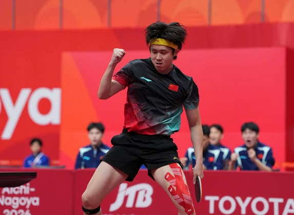 (260923) -- TOYOTA, Sept. 23, 2026 -- Wang Chuqin of China celebrates against Lin Yun-ju of Chinese Taipei during the men s team semifinal match between China and Chinese Taipei at the 20th Asian Games Aichi-Nagoya 2026 in Toyota of Aichi Prefecture, Japan, Sept. 23, 2026. ) (SP)JAPAN-TOYOTA-ASIAN GAMES Table tennis, Tischtennis MEN S TEAM-SEMIFINAL-CHN VS TPE CheongxKamxKa 