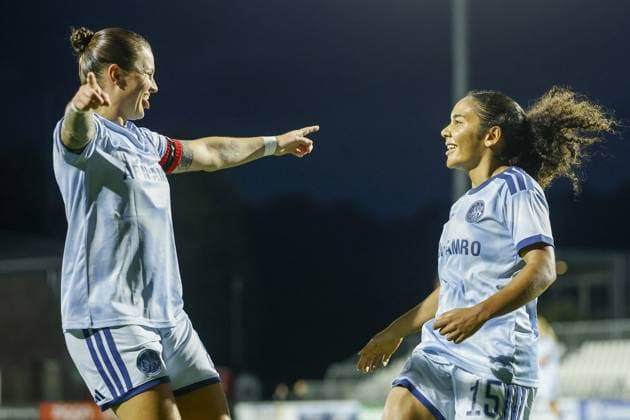 AMSTERDAM , 23-09-2026 , Sportcomplex De Toekomst , season 2026 2027 , UEFA Womens Europa Cup , Second qualifying round 1st leg , match between Ajax and WFC Aktobe (women) , picture shows goal celebration by Ajax player Ella Touon and Ajax player Sherida Spitse (5-0) Ajax - Aktobe (women)  x207464094x Copyright: