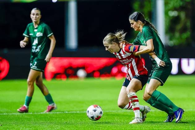 EINDHOVEN , 23-09-2026 , Ten Cate stadium De Herdgang , season 2026 2027 , UEFA Women™s Europa Cup , football , match between PSV and Fortuna Hjorring , picture shows PSV player Sara Thrige , Fortuna Hjorring player Signe Carstens PSV - Fortuna Hjorring  x207464104x Copyright: