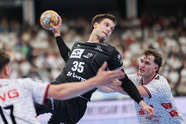 TV Hüttenberg - THW Kiel, DHB-Pokal Domen Makuc (THW Kiel, 35) gegen David Sehnke (TV Hüttenberg, 4). DHB-Pokalspiel der 2. Runde zwischen dem TV Hüttenberg und dem THW Kiel am 23. September 2026 in der Buderus-Arena in Wetzlar., Wetzlar Hessen Deutschland Buderus-Arena