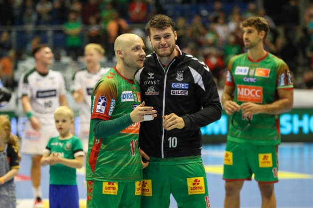 23.09.2026, xgox, Handball - DHB Pokal 2. Runde SC Magdeburg - HSG Wetzlar emspor, v.l. Daniel Pettersson (Magdeburg, 11), Elvar Oern Jonsson (Magdeburg, 19) Jubel ueber den Sieg, Jubel nach Spielende Magdeburg