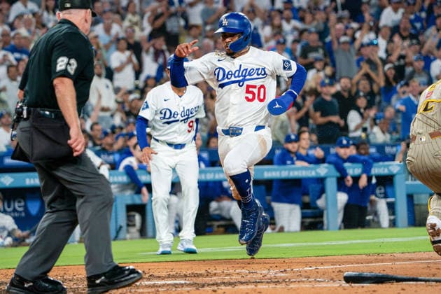 September 24, 2026, Los Angeles, California, USA: Mookie Betts 50 of the Los Angeles Dodgers scores on a single by Freddie Freeman 5 during a regular-season MLB, Baseball Herren, USA game against the San Diego Padres on Thursday September 24, 2026 at Dodger Stadium in Los Angeles, California.Dodgers defeat Padres, 7-0. ENRIQUE GURROLA BNS PI Dodgers Defeat Padres, 7-0 - ZUMAp124 20260924_zaa_p124_025 Copyright: xEnriquexGurrolax