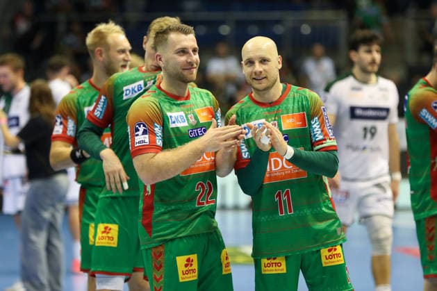 23.09.2026, xgox, Handball - DHB Pokal 2. Runde SC Magdeburg - HSG Wetzlar emspor, v.l. Lukas Mertens (Magdeburg, 22), Daniel Pettersson (Magdeburg, 11) Jubel ueber den Sieg, Jubel nach Spielende Magdeburg