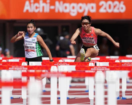 (260924) -- NAGOYA, Sept. 24, 2026 -- Tanaka Yuri (R) of Japan and Ugiloy Norboeva of Uzbekistan compete during the women s heptathlon 100m hurdles of Athletics at the 20th Asian Games Aichi-Nagoya 2026 in Nagoya, Japan, Sept. 24, 2026. ) (SP)JAPAN-NAGOYA-ASIAN GAMES-ATHLETICS-WOMEN S HEPTATHLON-100M HURDLES JiaxYuchen 