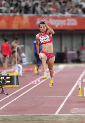 (260924) -- NAGOYA, Sept. 24, 2026 -- Huang Yingying of China competes during the women s triple jump final of Athletics at the 20th Asian Games Aichi-Nagoya 2026 in Nagoya, Japan, Sept. 24, 2026. ) (SP)JAPAN-NAGOYA-ASIAN GAMES-ATHLETICS-WOMEN S TRIPLE JUMP FINAL JiaxYuchen 