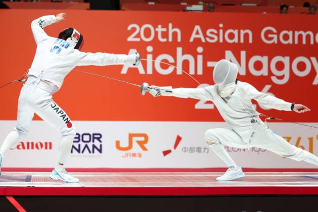 (260924) -- TOKONAME, Sept. 24, 2026 -- Kano Koki (L) of Japan competes against Kirill Prokhodov of Kazakhstan during the men s epee individual gold medal bout of fencing at the 20th Asian Games Aichi-Nagoya 2026 in Tokoname, Aichi Prefecture, Japan, Sept. 24, 2026. ) (SP)JAPAN-TOKONAME-ASIAN GAMES-FENCING-MEN S EPEE YaoxQilin 