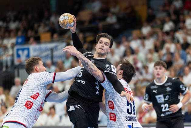 TV Hüttenberg - THW Kiel, DHB-Pokal Domen Makuc (THW Kiel, 35), Rasmus Ankermann (THW Kiel, 22), Leif Haack (TV Hüttenberg, 20), Hendrik Schreiber (TV Hüttenberg, 51) DHB-Pokalspiel der 2. Runde zwischen dem TV Hüttenberg und dem THW Kiel am 23. September 2026 in der Buderus-Arena in Wetzlar., Wetzlar Hessen Deutschland Buderus-Arena