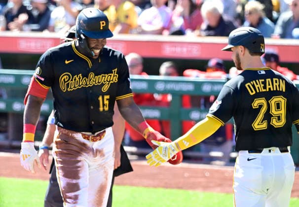 Pittsburgh Pirates center fielder Oneil Cruz (15) celebrates scoring in the first inning against the St. Louis Cardinals with Pittsburgh Pirates right fielder Ryan O Hearn (29)at PNC Park on Thursday, Sept. 24, 2026 in Pittsburgh.  PIT2026092409 ArchiexCarpenter