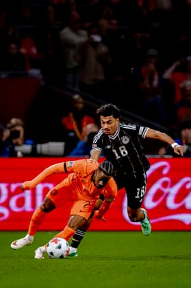 AMSTERDAM - Nederland forward Crysencio Summerville, Duitsland defender Nathaniel Brown during the UEFA Nations League match between Nederland and Duitsland at Johan Cruijff ArenA on 24 September 2026 in Amsterdam, Nederland. (Photo by DeFodi Images) -