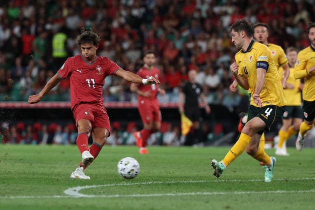 Lisbon, Portugal - September 24: Joao Felix (Portugal) scores the goal to 1:0, Ben Davies (Wales) during the UEFA Nations League 2026 27 League Phase Matchday 1 match between Portugal and Wales at Estadio Jose Alvalade on September 24, 2026 in Lisbon, Portugal Copyright: HMBxMedia JoaquimxFerreira