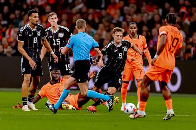 AMSTERDAM - Nederland forward Brian Brobbey, Duitsland midfielder Joshua Kimmich during the UEFA Nations League match between Nederland and Duitsland at Johan Cruijff ArenA on 24 September 2026 in Amsterdam, Nederland. (Photo by DeFodi Images) -