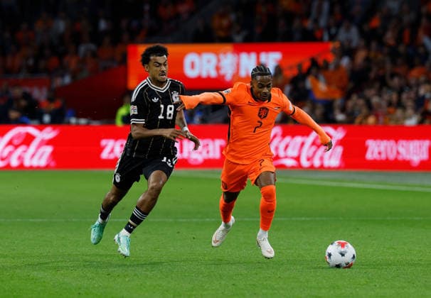 24.09.2026, xjrdrx, Fussball UEFA Nations League, Niederlande - Deutschland v.l. Nathaniel Brown (Deutsche Fussball Nationalmannschaft DFB), Crysencio Summerville (Niederlande) Amsterdam