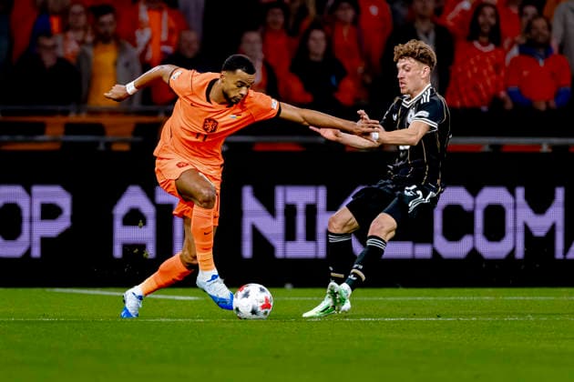 AMSTERDAM - Nederland forward Cody Gakpo and Duitsland defender Philipp Treu during the UEFA Nations League match between Nederland and Duitsland at Johan Cruijff ArenA on 24 September 2026 in Amsterdam, Nederland. (Photo by DeFodi Images) -