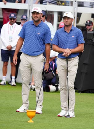 MEDINAH, IL - SEPTEMBER 24: Team USA golfers Scottie Scheffler on left and Sam Burns on right wait on the first tee during the first round of the 2026 Presidents Cup on September 24, 2026, at Medinah Country Club in Medinah, Illinois. (Photo by Brian Spurlock Icon Sportswire) GOLF: SEP 24 Presidents Cup EDITORIAL USE ONLY Icon26092419