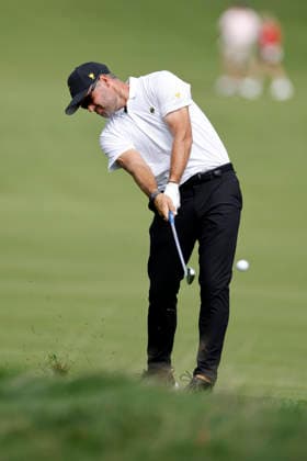MEDINAH, IL - SEPTEMBER 24: Corey Conners of Canada and the International Team plays from the rough at the first hole during Thursday s Four-ball matches on day one of the Presidents Cup 2026 on September 24, 2026 at Medinah Country Club in Medinah, Illinois. (Photo by Joe Robbins Icon Sportswire) GOLF: SEP 24 Presidents Cup EDITORIAL USE ONLY Icon573260924028