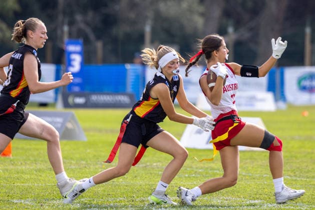 Austria Player runs with the ball and is tackled by German Player, U17, U 17 Girls Germany vs Austria IFAF European Youth Championships 2026, 24.09.2026 Lido Delle Nazioni Lido Delle Nazioni Italia Copyright: xPFA BjörnxKeckerx