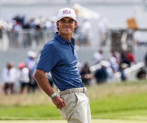 Jackson Koivun of the US reacts as he misses his putt on the fourth hole during round one Four-ball play in the Presidents Cup golf tournament at Medinah Country Club in Medinah, Illinois on Thursday, September 24, 2026.  MED20260924840 TANNENxMAURY