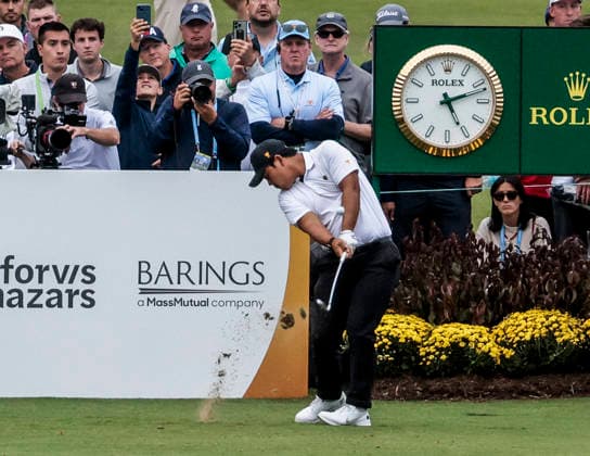International team member Tom Kim of South Korea hits his tee shot on the sixteenth hole during round one Four-ball play in the Presidents Cup golf tournament at Medinah Country Club in Medinah, Illinois on Thursday, September 24, 2026.  MED20260924867 TANNENxMAURY