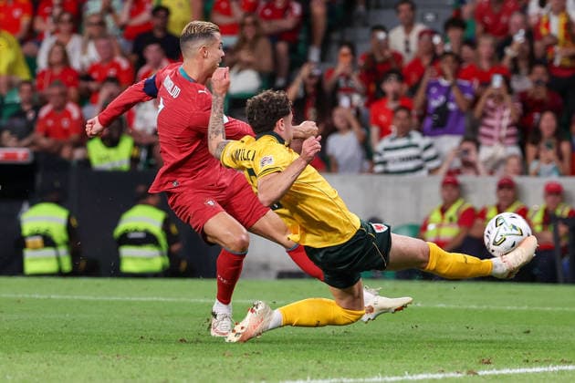 Lisbon, Portugal - September 24: Cristiano Ronaldo (Portugal), Ben Davies (Wales) in action, with the ball during the UEFA Nations League 2026 27 League Phase Matchday 1 match between Portugal and Wales at Estadio Jose Alvalade on September 24, 2026 in Lisbon, Portugal Copyright: HMBxMedia JoaquimxFerreira