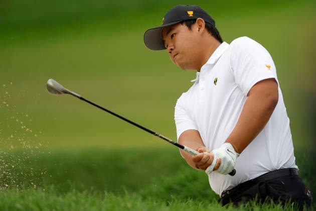 MEDINAH, IL - SEPTEMBER 24: Tom Kim of South Korea watches his shot from the bunker on No. 15 during the opening four ball session of the Presidents Cup, September 24, 2026, at Medinah Country Club in Medinah, Illinois. (Photo by Matthew Maxey Icon Sportswire) GOLF: SEP 24 Presidents Cup EDITORIAL USE ONLY Icon260924062