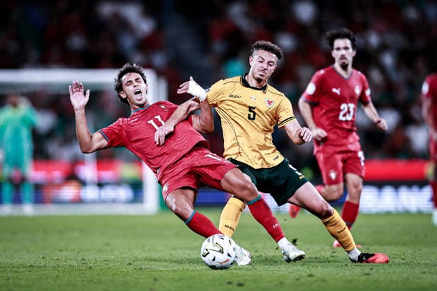 September 24, 2026, Lisboa, Portugal: JOAO FELIX of Portugal national team, Nationalteam is tackled by ETHAN AMPADU of Wales National Team during the UEFA Nations League League Phase Matchday 1 match between Portugal and Wales at Estadio Jose Alvalade. Portugal won 1:0. Soccer 2026: Portugal 1:0 Wales  - ZUMAg283 20260924_zsp_g283_140 Copyright: xJoaoxGregoriox