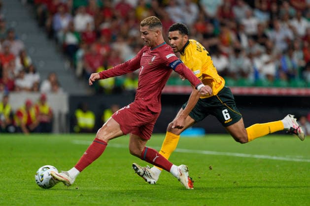 Portugal Vs Wales in Lisbon, Portugal - 24 Sep 2026 Cristiano Ronaldo of Portugal (L) and Ben Cabango of Wales (R) seen in action during the UEFA Nations League, League A, Group A4, Matchday 1 between Portugal and Wales at Estadio Jose Alvalade. Final score: Portugal 1:0 Wales. Lisbon Portugal Copyright: xBrunoxdexCarvalhox xSOPAxImagesx brunodecarvalho_portugalwales-1055