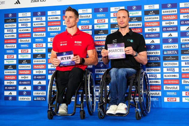 v. L. Jetze, Plat (Dutch paralympic athlete), Marcel Hug (Gewinner 2022), GER, Pressekonferenz, BMW Berlin Marathon 2026, Toplaeufer der Herren, 25.09.2026 GER, Pressekonferenz, BMW Berlin Marathon 2026, Toplaeufer der Herren, 25.09.2026 Berlin