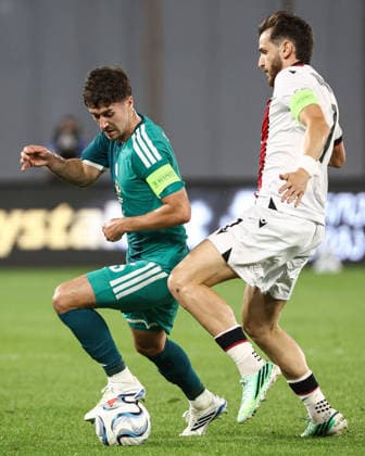 UEFA Nations League Group Stage, Boris Paitchadze Dinamo Arena, Tbilisi, Georgia 25 9 2026 Georgia vs Northern Ireland Northern Ireland™s Trai Hume with Georgia s Khvicha Kvaratskhelia Trai Hume with Khvicha Kvaratskhelia 25 9 2026  Copyright: xx Georgia v N Ireland_053