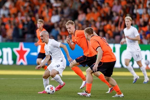 DEVENTER , 25-09-2026 , Stadium De Adelaarshorst , season 2026 2027 , EURO U-21 Qualification football . match between Netherlands U-21 and Norway U-21, Picture shows Netherlands U21, U 21 player Mats Rots vs Norway U21 player Marius Broholm Netherlands U21 - Norway U21  x207557088x Copyright: