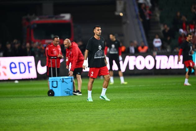 Turkiye v France - UEFA Nations League KOCAELI, TURKIYE - SEPTEMBER 25: Turkiye national team, Nationalteam player Zeki Celik takes to the pitch to warm up ahead of the UEFA Nations League A League Group 1 match between Turkiye and France at Kocaeli Stadium in Kocaeli, Turkiye, on September 25, 2026. Turkiye national team players wear black T-shirts featuring a photo of Ebubekir Ucar, a Turkish Football Federation (TFF) staff member who died in a traffic accident, to honor his memory before the match. Oguz Yeter Anadolu Kocaeli Turkey. Editorial use only. Please get in touch for any other usage.  Copyright: x2026xAnadoluxOguzxYeterx