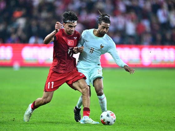 Turkiye v France - UEFA Nations League KOCAELI, TURKIYE - SEPTEMBER 25: Turkiye national team, Nationalteam players Can Uzun (11) competes with France national team player Olise during the UEFA Nations League A League Group 1 match between Turkiye and France at Kocaeli Stadium in Kocaeli, Turkiye, on September 25, 2026. Abdulhamid Hosbas Anadolu Kocaeli Turkey. Editorial use only. Please get in touch for any other usage.  Copyright: x2026xAnadoluxAbdulhamidxHosbasx