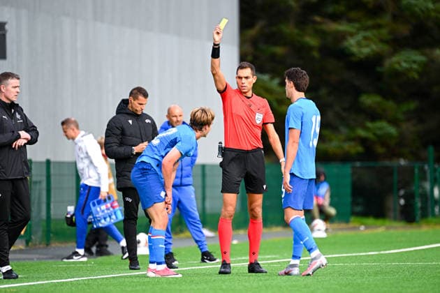 Iceland v France - Euro U21, U 21 2027 - Qualifications Luca ZUFFERLI Referee show a yellow card to Daniel Freyr Kristjansson of Iceland U21 during Euro U21 2027 Qualifications match between Iceland and France at Throttarvollur on September 25, 2026 in Reykjavik, Iceland. Reykjavik Iceland  Copyright: xSandraxRuhautx 776567071