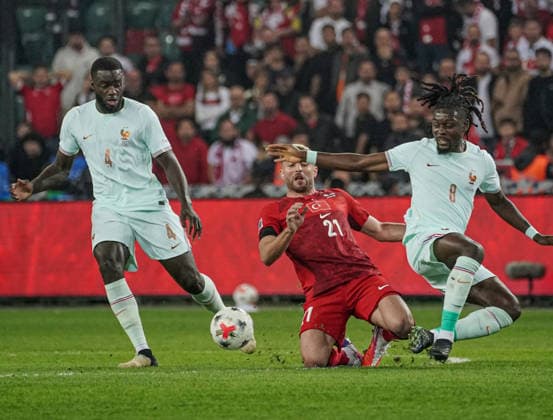 Turkiye v France - UEFA Nations League KOCAELI, TURKIYE - SEPTEMBER 25: Turkiye national team, Nationalteam player Baris Alper Yilmaz (21) competes with France national team players during the UEFA Nations League A League Group 1 match between Turkiye and France at Kocaeli Stadium in Kocaeli, Turkiye, on September 25, 2026. Salih Zeki Fazlioglu Anadolu Kocaeli Turkey. Editorial use only. Please get in touch for any other usage.  Copyright: x2026xAnadoluxSalihxZekixFazlioglux