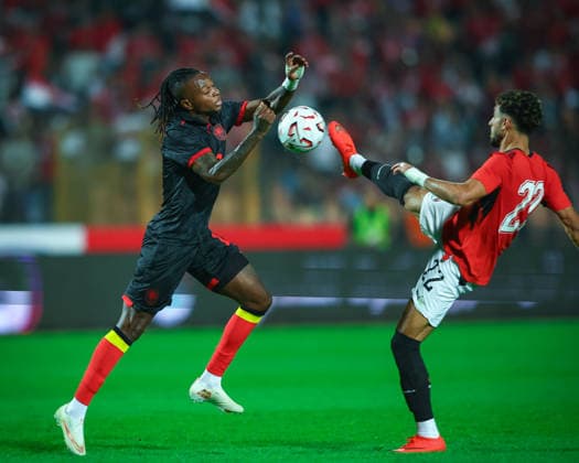 Egypt v Angola at the Africa Cup of Nations Qualifiers 2027 - Group B Omar Marmoush and Chico Banza during the match between Egypt v Angola at the Africa Cup of Nations Qualifiers KE.TZ.UG 2027 Group B at Cairo International Stadium, Cairo, Egypt Cairo Cairo Egypt Copyright: xMohamedxTageldinx