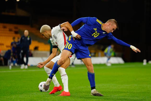 Wolverhampton, England, 25th September 2026. Rico Lewis of England U21, U 21 and Yan Trufanov of Kazakhstan U21 during the England U21 vs Kazakhstan U21 UEFA European Under-21 Championship Qualifier match at Molineux, Wolverhampton. Picture credit should read: James Baylis Sportimage EDITORIAL USE ONLY. No use with unauthorised audio, video, data, fixture lists, club league logos or live services. Online in-match use limited to 120 images, no video emulation. No use in betting, games or single club league player publications. 159_SPI_JB_U21_ENGLAND_KAZAKHSTAN SPI-5018-0159