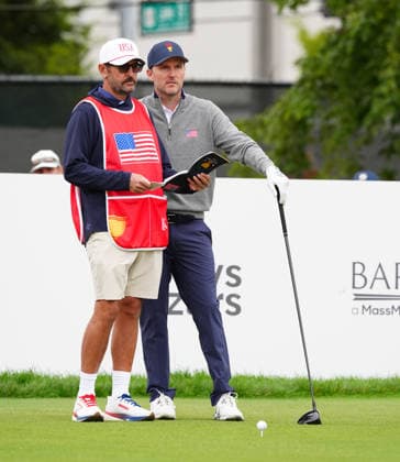 MEDINAH, IL - SEPTEMBER 25: Team USA golfer Russell Henley talks to his caddie on the 3rd tee during the second round of the 2026 Presidents Cup on September 25, 2026, at Medinah Country Club in Medinah, Illinois. (Photo by Brian Spurlock Icon Sportswire) GOLF: SEP 25 Presidents Cup EDITORIAL USE ONLY Icon26092567