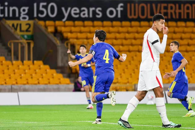 England v Kazakhstan - UEFA U21, U 21 EURO 2027 Qualifier 4 Sultan Askarov of Kazakhstan races to congratulate goalscorer 9 Artyom Litosh of Kazakhstan (not pictured) during the UEFA Under 21 Championship Group D Qualifying match between England Under 21s and Kazakhstan at Molineux in Wolverhampton, on September 25, 2026. Wolverhampton West Midlands United Kingdom  Copyright: xMIxNewsx originalFilename:fletcher-englandu260925_np9hs.jpg
