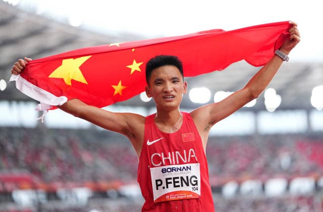 (260926) -- NAGOYA, Sept. 26, 2026 -- Feng Peiyou of China celebrates after the men s marathon final of athletics at the 20th Asian Games Aichi-Nagoya 2026 in Nagoya, Japan, Sept. 26, 2026. ) (SP)JAPAN-NAGOYA-ASIAN GAMES-ATHLETICS-MEN S MARATHON LuixSiuxWai