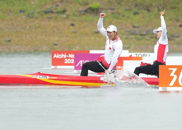 (260926) -- NAGOYA, Sept. 26, 2026 -- Wu Shengyue (L) Ma Yanan of China celebrate as they cross the finish line during the mixed canoe double 500m final of canoe sprint at the 20th Asian Games Aichi-Nagoya 2026 in Miyoshi of Aichi Prefecture, Japan, Sept. 26, 2026. ) (SP)JAPAN-NAGOYA-ASIAN GAMES-CANOE SPRINT-MIXED CANOE DOUBLE 500M-FINAL ZhangxHaobo 