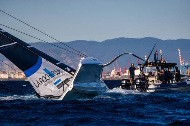 La Roche-Posay Racing Team capsized on the start line for Race 2 of Day 1. Louis Vuitton 38th America s Cup Preliminary Regatta, Naples, Italy. Friday 25 September 2026. Photo: Georgia Schofield NZ Naples Italy Copyright: xx