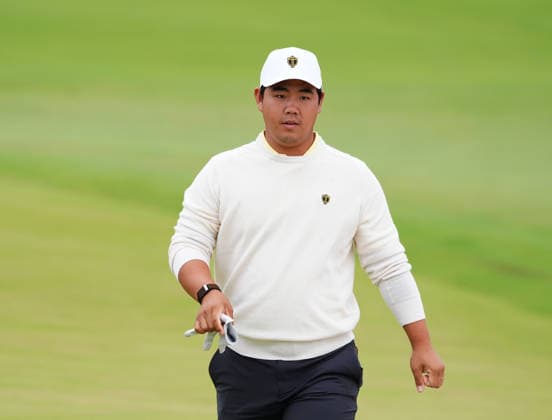 MEDINAH, IL - SEPTEMBER 25: Team International golfer Tom Kim walks the 3rd hole during the second round of the 2026 Presidents Cup on September 25, 2026, at Medinah Country Club in Medinah, Illinois. (Photo by Brian Spurlock Icon Sportswire) GOLF: SEP 25 Presidents Cup EDITORIAL USE ONLY Icon260925136