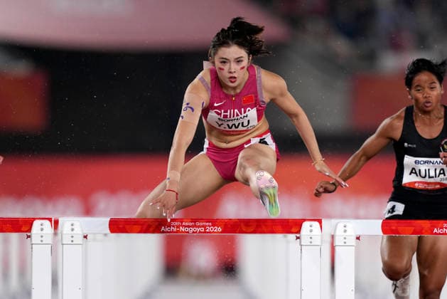 (260926) -- NAGOYA, Sept. 26, 2026 -- Wu Yanni (L) of China competes during the women s 100m hurdles round 1 match of Athletics at the 20th Asian Games Aichi-Nagoya 2026 in Nagoya, Japan, Sept. 26, 2026. ) (SP)JAPAN-NAGOYA-ASIAN GAMES-ATHLETICS-WOMEN S 100M HURDLES LuixSiuxWai 