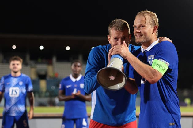 San Marino v Finland - UEFA Nations League - Season 2026-2027 Serravalle, Italy, 26th September 2026. Joel Pohjanpalo and Lukas Hradecky of Finland sing in to a megaphone following the final whistle of the San Marino vs Finland UEFA Nations League match at San Marino Stadium, Serravalle. Picture credit should read: Jonathan Moscrop Serravalle San Marino Stadium San Marino