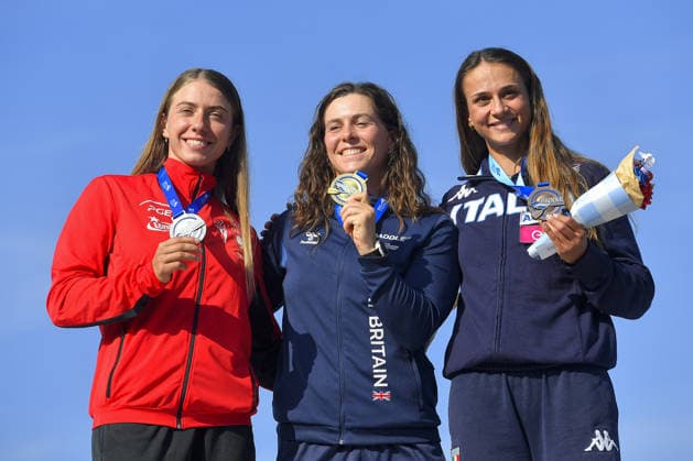 IPA89013933 - Ivrea, Italy, September 26, 2026—Paddle Europe Slalom Championships 2026: Women’s and Men’s Kayak Cross Individual Time Trial at the Canoe Stadium in Ivrea—bronze medal: Lucia Pistoni_28_(ITA) silver medal: Klaudia_4_ Zwolinska (POL) gold medal: Kimberley_5_ Woods (GBR) during the 2026 Paddle Europe Slalom Championships men s Kayak Cross Individual Time Trial at the Ivrea Stadium  Copyright: xTonelloxAbozzi IPAxSportx xx IPA89013933